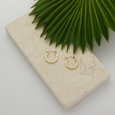 Solid Gold Oval Fancy Design Mini Hoop Earrings