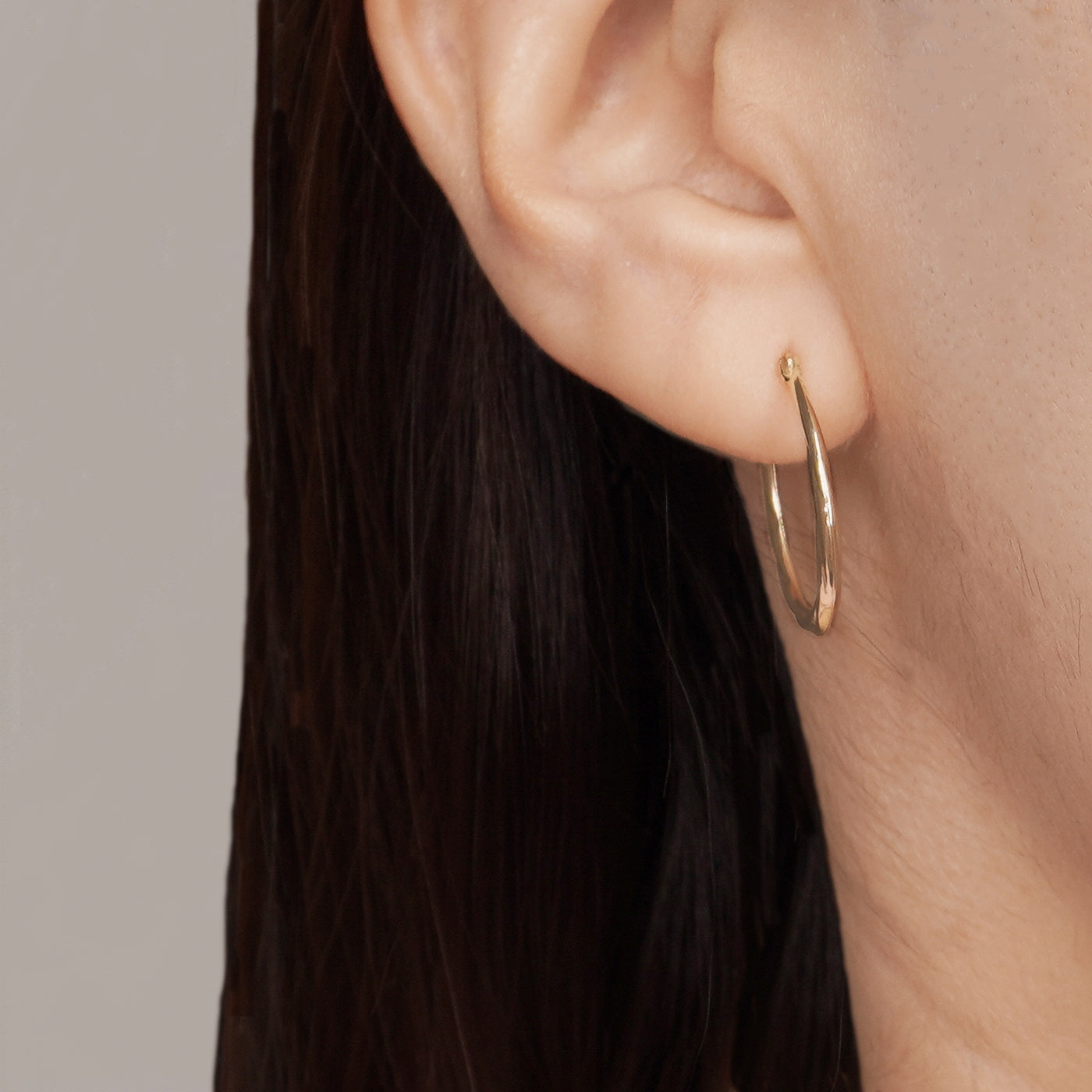 14K Twisted Oval Diamond Cut Hoop Earrings