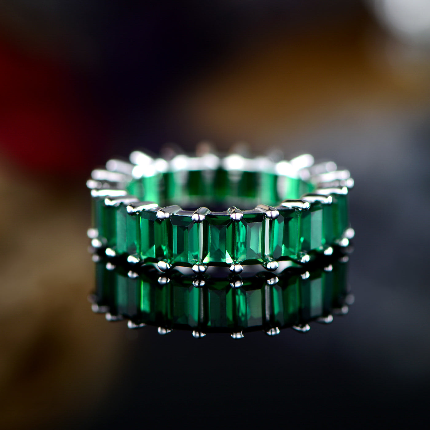 Green Emerald Cut Silver Eternity Ring